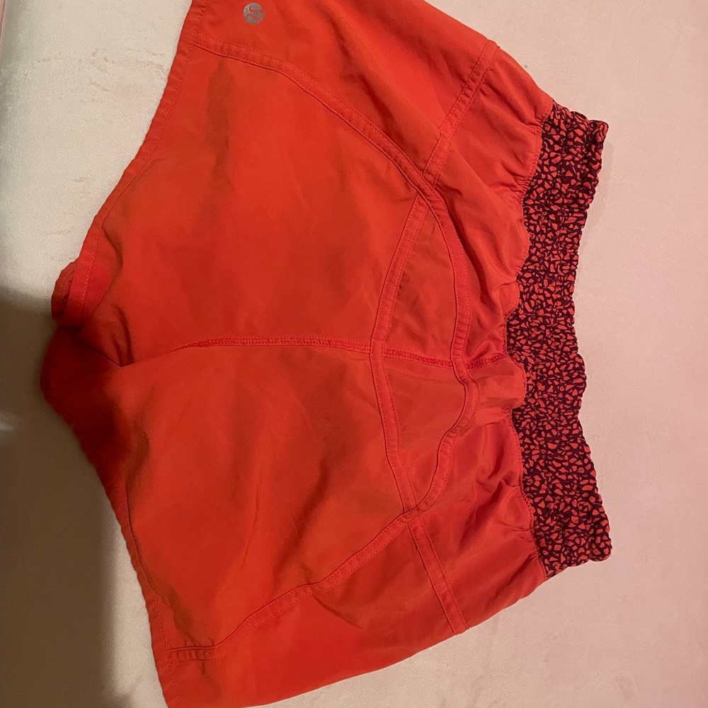 RELISTED - red/orange lululemon shorts SIZE 6
